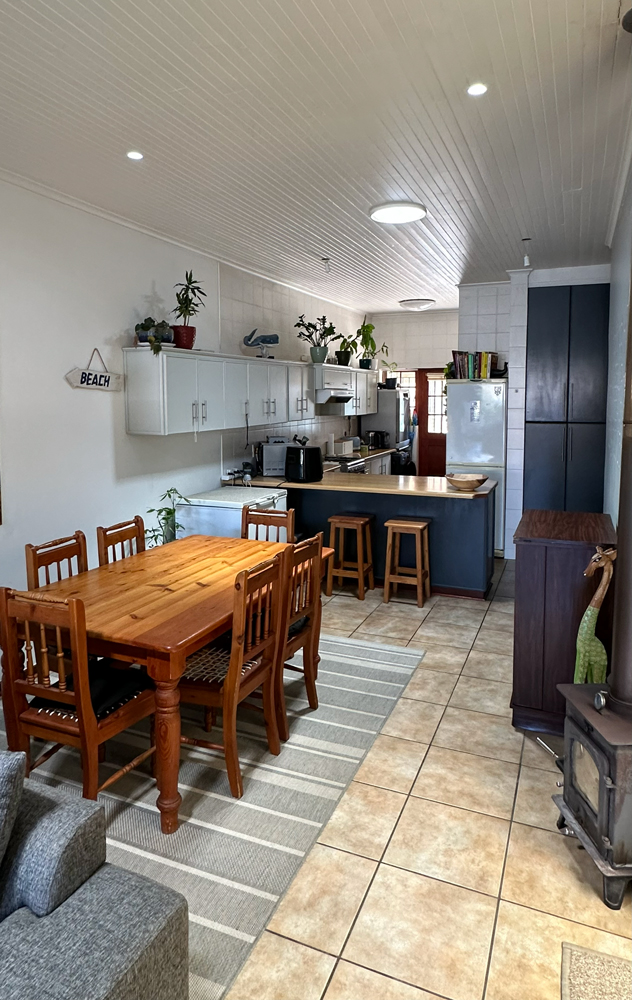Dining table and fireplace.
